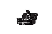 Woman sitting on the sofa black