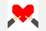 Businessman hands and  paper heart
