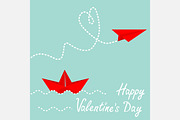 Red origami paper boat and plane.