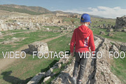 Child discovering ancient city and