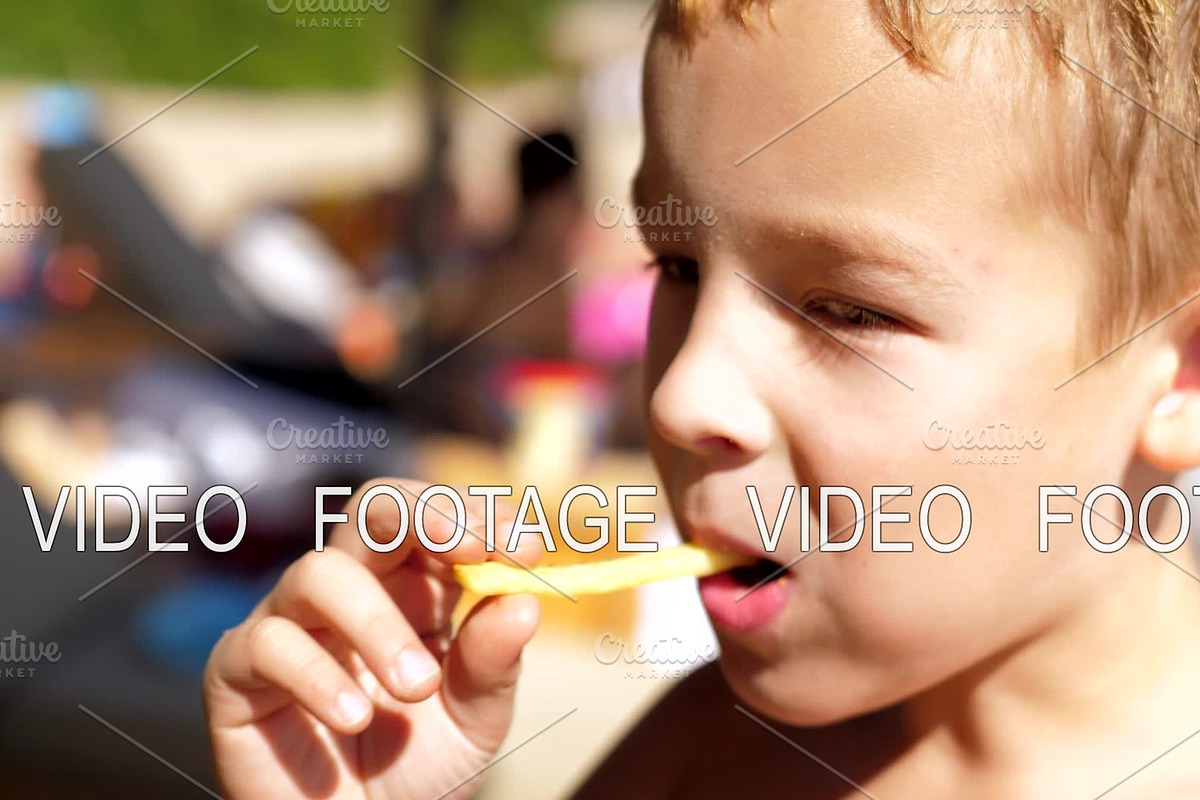 Child eating French fries at the in Graphics - product preview 8