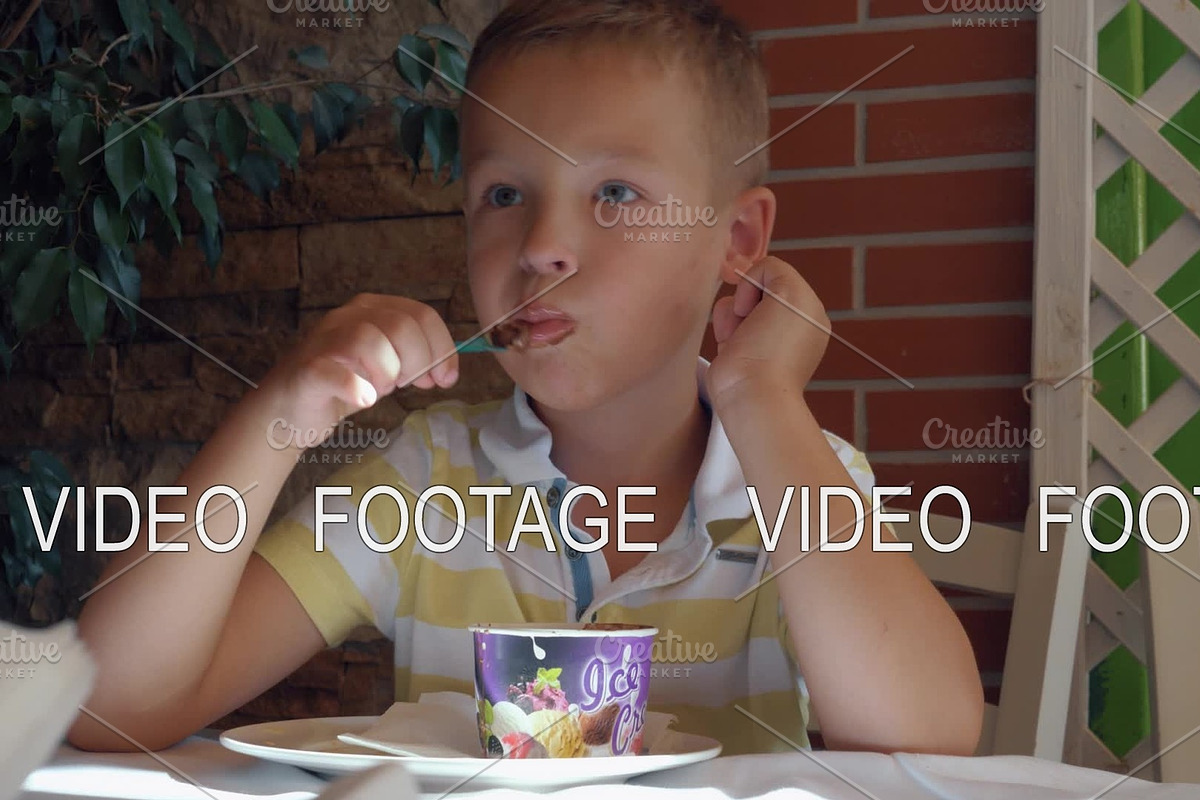 Kid eating chocolate ice cream in Graphics - product preview 8