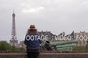 Woman tourist looking at Eiffel