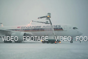 Timelapse shot of de-icing airplane