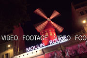Spinning red mill of Moulin Rouge in