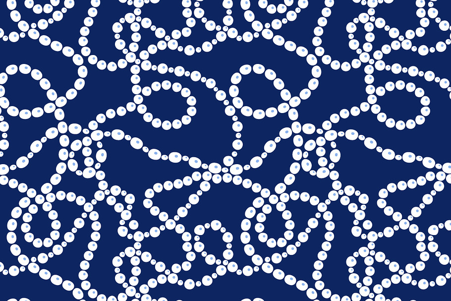 Tangled white pearls on blue pattern