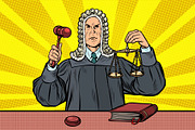 judge with a hammer. scales of