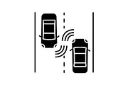 Autonomous cars on road glyph icon