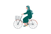 Muslim Woman in Hijab Riding Bike