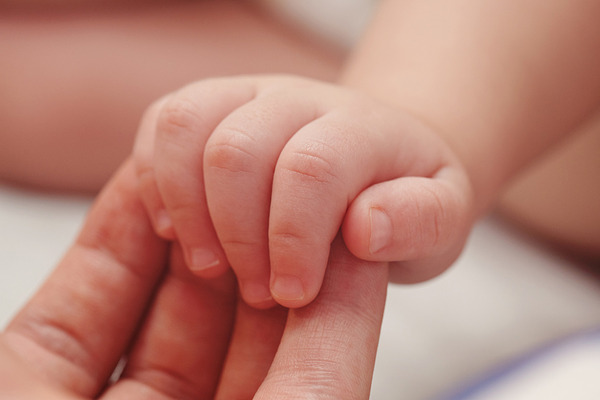 Baby hand on parent palm | High-Quality People Images ~ Creative ...