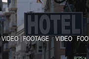 Blue hotel sign with white letters