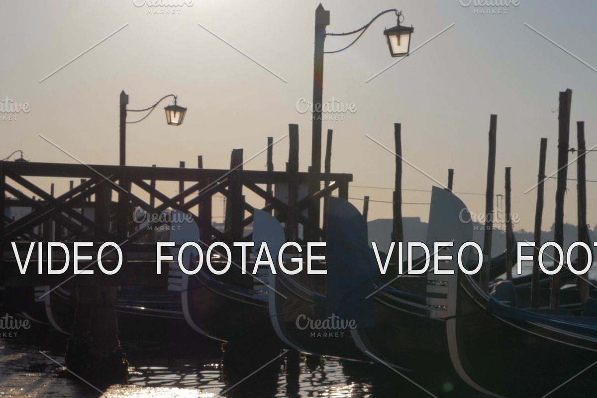 Gondolas moored at the dock with in Graphics - product preview 8