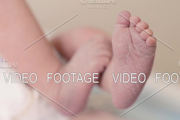 Newborn baby moving feet