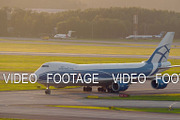 Taxiing cargo airplane Boeing 747