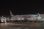 Flydubai aircraft with air bridge at