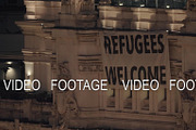 Refugees Welcome banner on Cybele