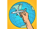 plane in hand. metaphor of flight to