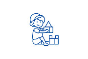 Boy playing with toys,box of bricks