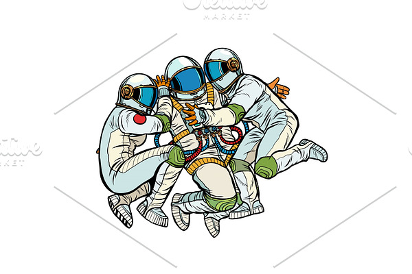 three astronauts hugging