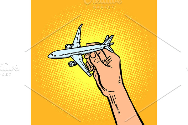passenger plane in hand. metaphor of