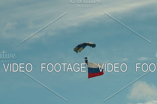 Skydiver with Russian flag in the