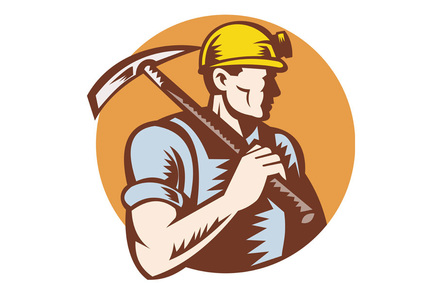 coal miner at work with pickaxe