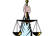 Hand holding scales of justice