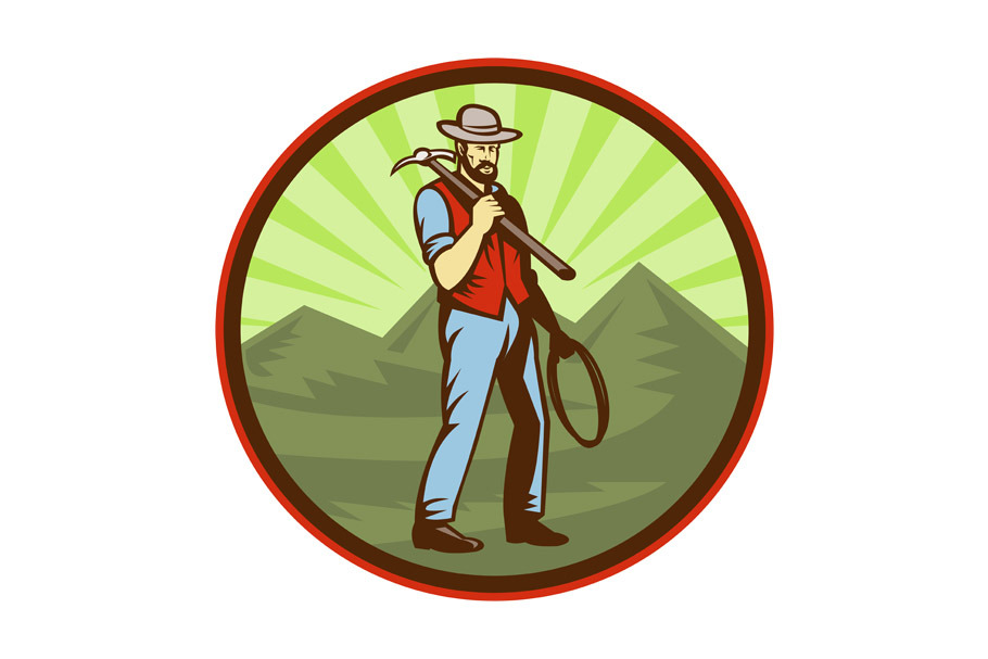 Miner carrying pick axe mountain