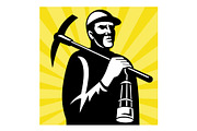 Coal miner with pick axe and lamp