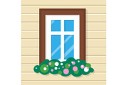 Window with Flowers in House. Street