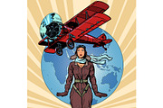 woman pilot of a vintage biplane