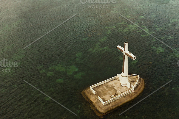 Sunken Cemetery cross in Camiguin