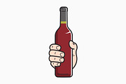Hand hold wine bottle.