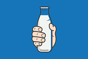 Hand hold milk bottle.