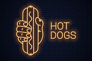 Hand hold hotdog neon banner.