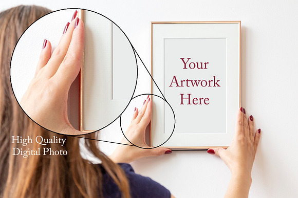 Woman holding frame on wall Mockup in Product Mockups - product preview 3