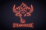 Bull head neon logo of steakhouse.