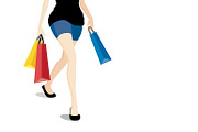 Woman walking with shopping bag