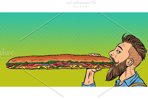 man eats a long sandwich