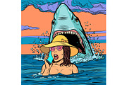 A shark attacks a woman at sea. The