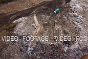 Aerial view on bulldozers working on