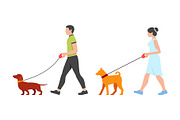 Man and Woman walking the dogs