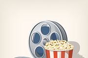 Popcorn box, film strip and tickets.