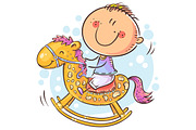 Little child riding a toy horse