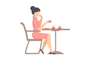 Woman in a pink dress is drinking