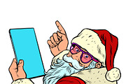 Santa Claus with a tablet. New year