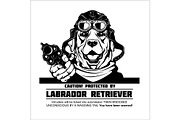 Labrador Retriever dog with gun -