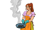 woman and a food burnt in a frying