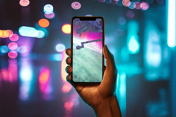 iPhone 11 on hand mockups in Scene Creator Mockups - product preview 4