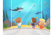Kids in aquarium. Childrens with